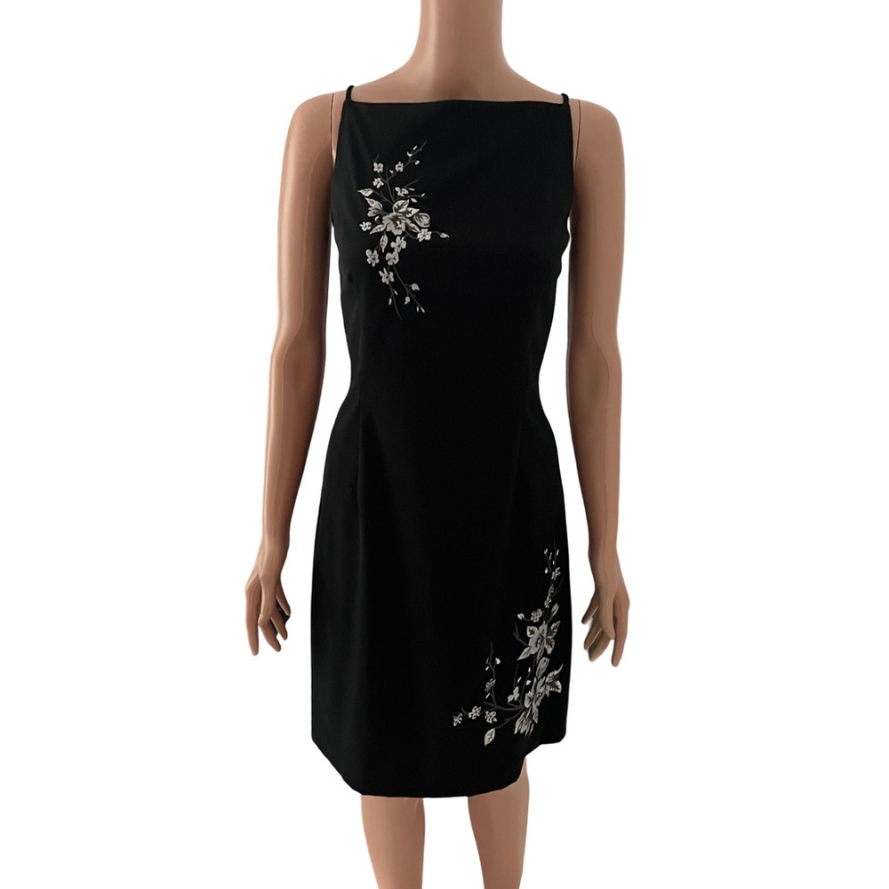 Pretty black dress with raised stitch flowers by CDC.